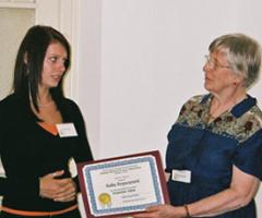 Dottie Speidel presenting Sona Svancarova with 1st place certificate